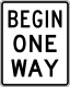 Begin one way &mdash; Regulatory sign &mdash; One Way and Divided Highway (MUTCD R6-6)