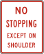 No stopping except on shoulder &mdash; Regulatory sign &mdash; Parking and Emergency Restrictions (MUTCD R8-6)
