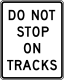 Do not stop on tracks &mdash; Regulatory sign &mdash; Lane Transitions Signs (MUTCD R8-8)