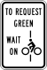 Bicycles to request green wait on line &mdash; Regulatory sign &mdash; Traffic Signal Signs (MUTCD R10-22)