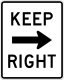 Keep right sign &mdash; Regulatory sign &mdash; Regulation of Movement Signs (MUTCD R4-7A)