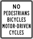 No Pedestrian Crossing, Bicycles, or Motorcycles &mdash; Regulatory sign &mdash; Exclusionary Signs (MUTCD R5-10)