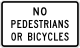 No Pedestrians or Bicycles &mdash; Regulatory sign &mdash; Exclusionary Signs (MUTCD R5-10B)