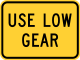 Use low gear (plaque) &mdash; Regulatory sign &mdash; Divided Highways and Hills Signs (MUTCD W7-2P)