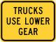 Trucks use lower gear (plaque) &mdash; Regulatory sign &mdash; Divided Highways and Hills Signs (MUTCD W7-2BP)