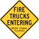 Fire trucks entering when signal flashes sign, Wisconsin &mdash; Regulatory sign &mdash; Advance Warnings and Crossings Signs